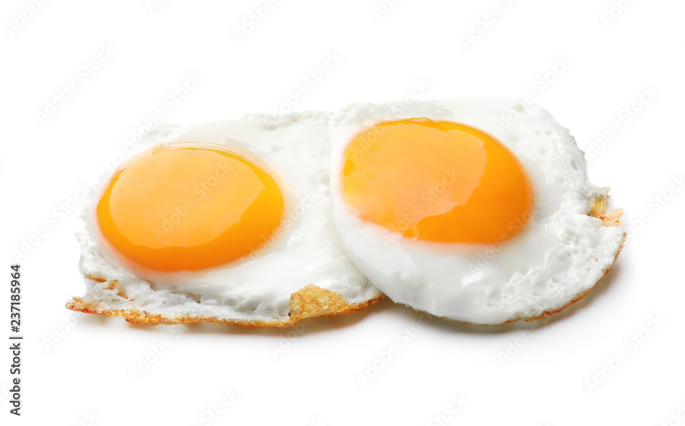 Tasty fried eggs on white background