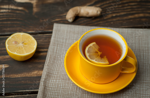 lemon ginger tea on wooden table