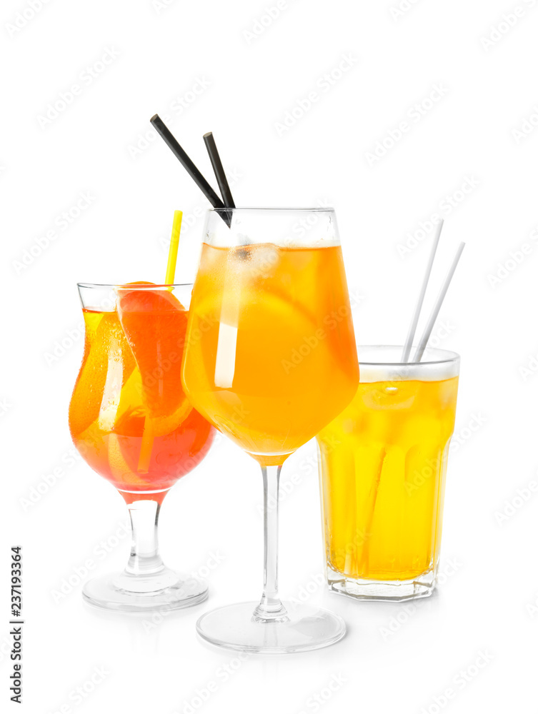 Tasty cocktails on white background