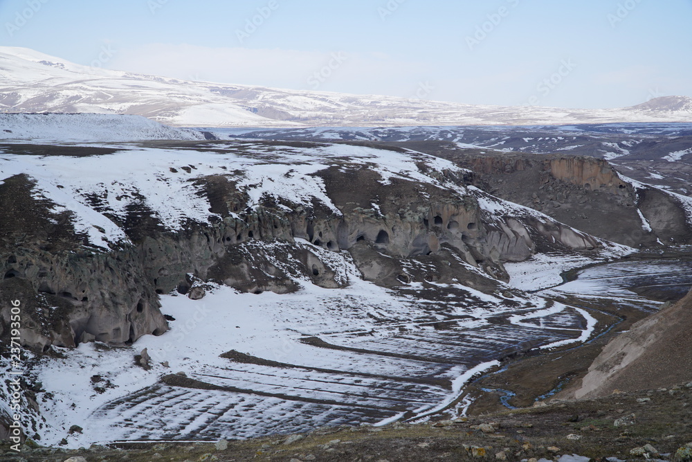 snow covered mountains in Ani Ruins in Kars, Turkey.