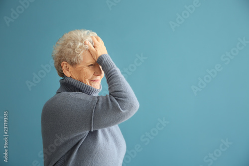Portrait of elderly woman a...