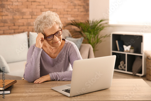 Senior woman suffering from...