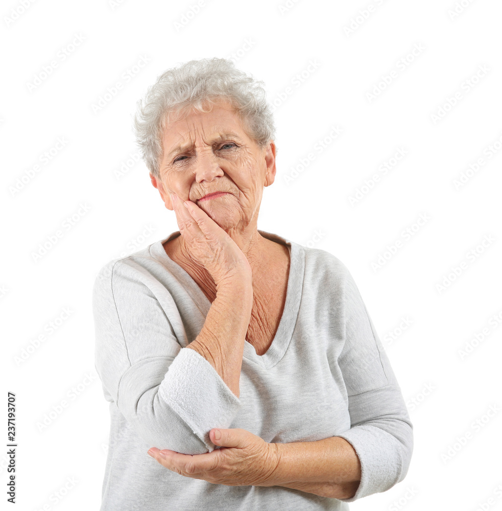 Senior woman suffering from toothache on white background Senior woman suffering from toothache on white background