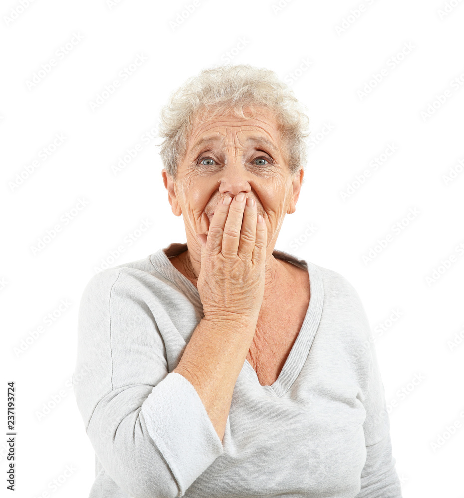 Portrait of elderly woman after making mistake on white background Portrait of elderly woman after making mistake on white background