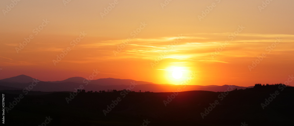 Picturesque sunset landscape in the countryside in Tuscany
