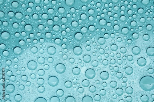 drops water on blue background