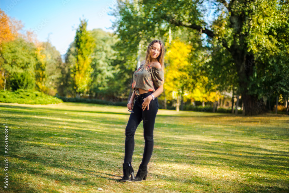 Photographing a girl during autumn with a blurred background Photographing a girl during autumn with a blurred background
