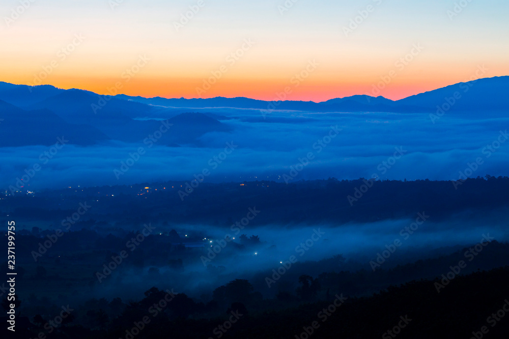 Sunrise in Northern Thailand with a misty landscape