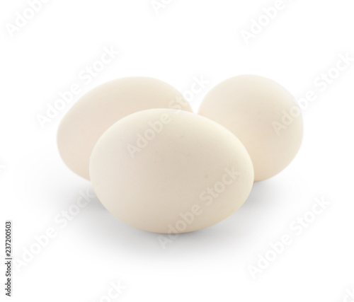 Raw chicken eggs on white background
