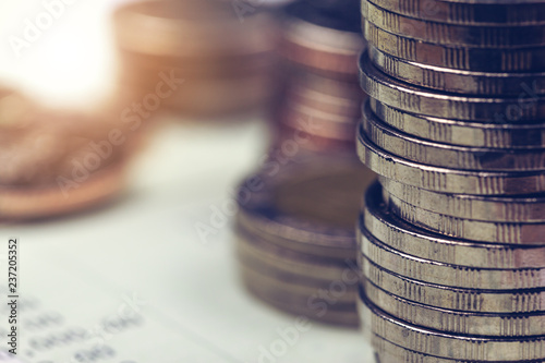 Stack of coins on account book