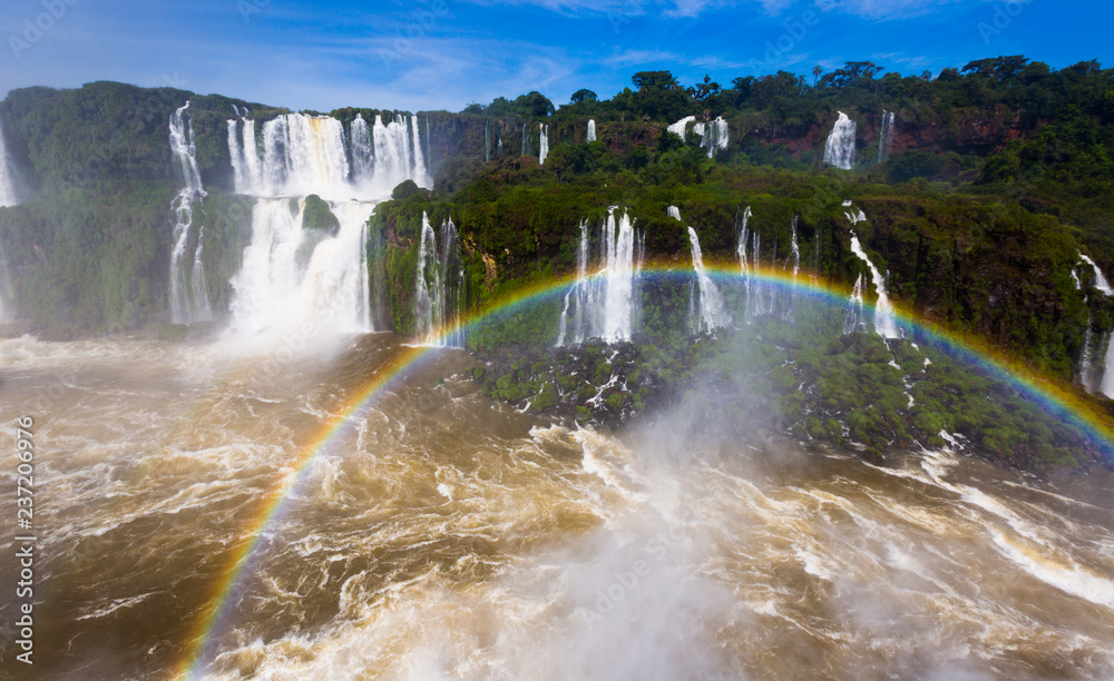 Rainbow over Cataratas del Iguazu waterfall, Brazil