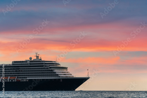 Fototapeta Naklejka Na Ścianę i Meble -  Luxury cruise ship in the sea at sunset. with copy space for your text message or content