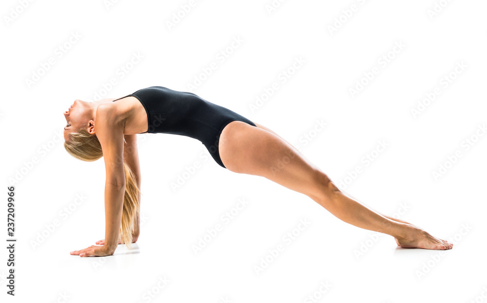 Young blonde woman in maillot practicing yoga lesson Young blonde woman in maillot practicing yoga lesson