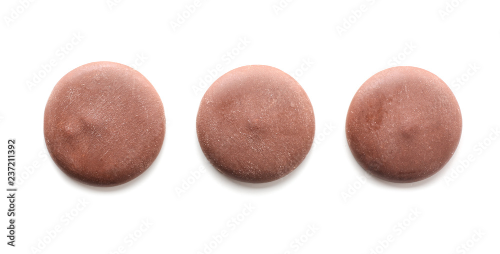 Delicious dark chocolate chips on white background Delicious dark chocolate chips on white background