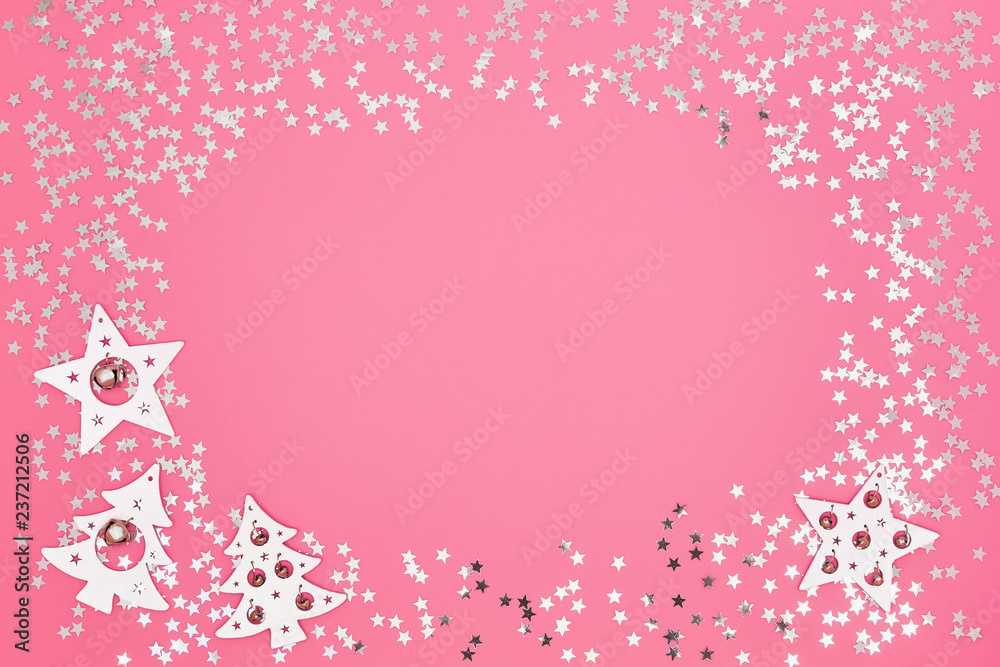 Christmas card. Christmas white and silver decorations on bright pink background. Copy space, top view. Flat lay Christmas card. Christmas white and silver decorations on bright pink background. Copy space, top view. Flat lay