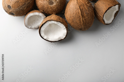 Ripe coconuts on light background