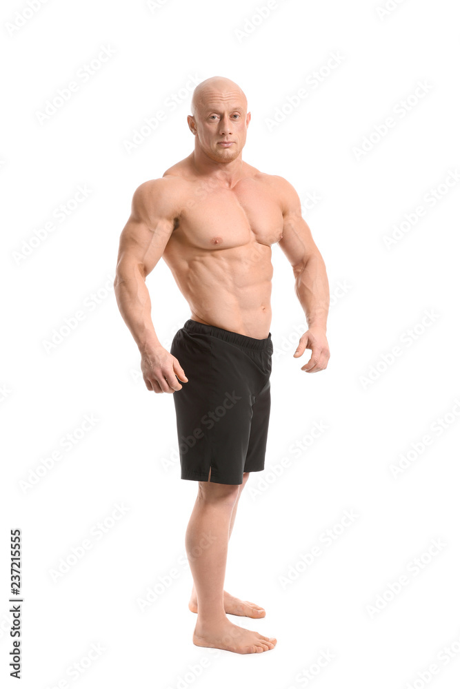 Muscular bodybuilder on white background