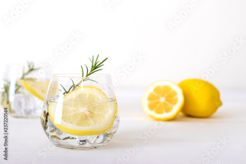 Lemon drink on white wooden background. health drink concept.