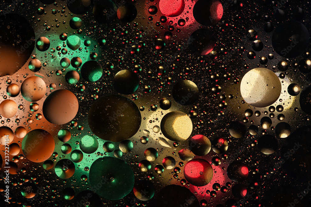 water drops on glass with colorful background, close-up water drops on glass with colorful background, close-up