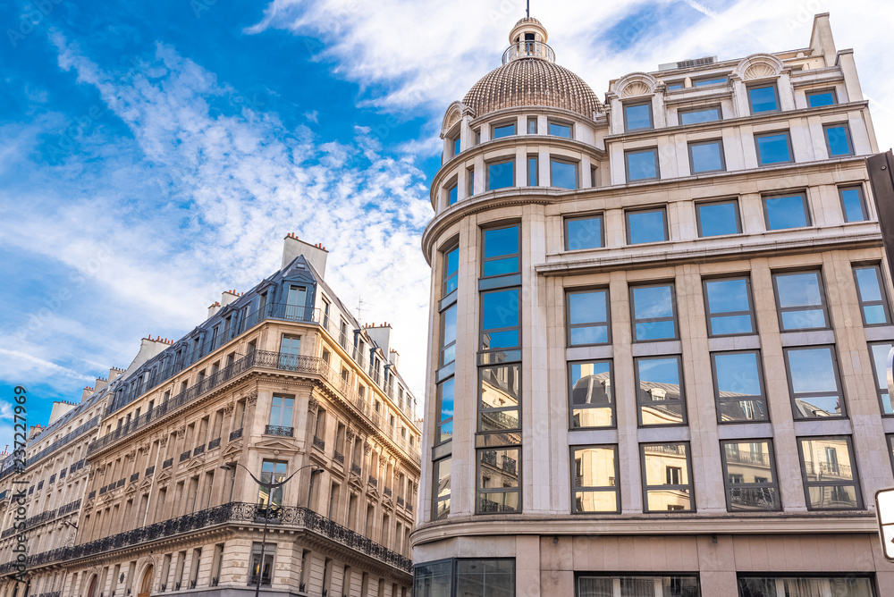 Paris, beautiful buildings boulevard Haussmann, typical parisian facades 