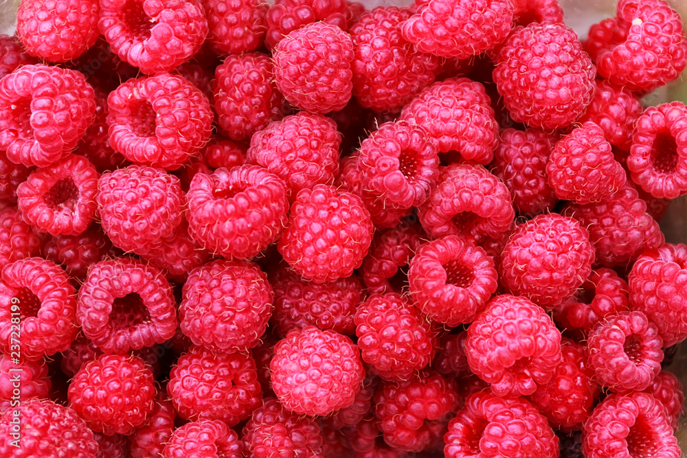 Fresh raspberries background. Summer day, healthy life Fresh raspberries background. Summer day, healthy life
