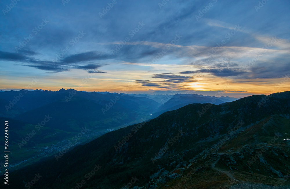 Sunrise from the top of Helm (M. Elmo - 2,434m) down the Pustertal into Austria - Sexten Dolomites, Italy