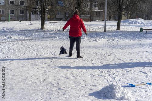 Fototapeta Naklejka Na Ścianę i Meble -  Children sledding in winter