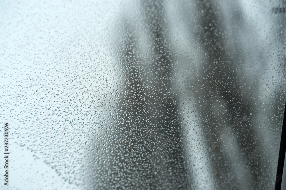The side window of the car in the winter, drops ,misted and doesn't open or froze