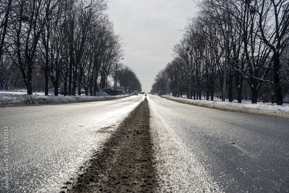 Fototapeta premium In winter the road is for cars
