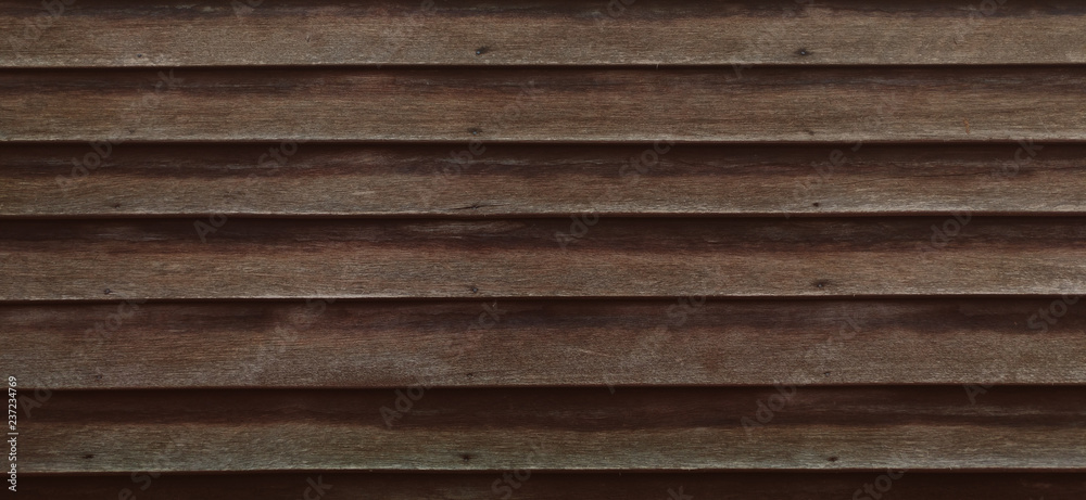 The Old dark wooden texture pattern background.