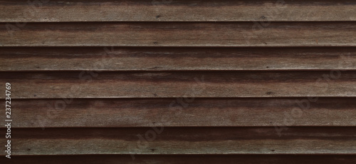 The Old dark wooden texture pattern background.
