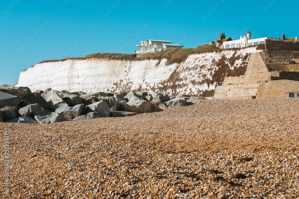 Saltdean beach seafront cliffs with weekend house in the background at East Sussex Brighton marina, UK. Saltdean beach seafront cliffs with weekend house in the background at East Sussex Brighton marina, UK.