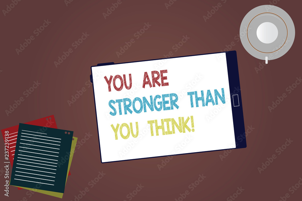 Word writing text You Are Stronger Than You Think. Business concept for Adaptability Strength to overcome obstacles Tablet Empty Screen Cup Saucer and Filler Sheets on Blank Color Background Word writing text You Are Stronger Than You Think. Business concept for Adaptability Strength to overcome obstacles Tablet Empty Screen Cup Saucer and Filler Sheets on Blank Color Background