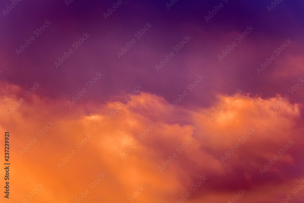 A multicolored bright sky with clouds during the sunrise or sunset_