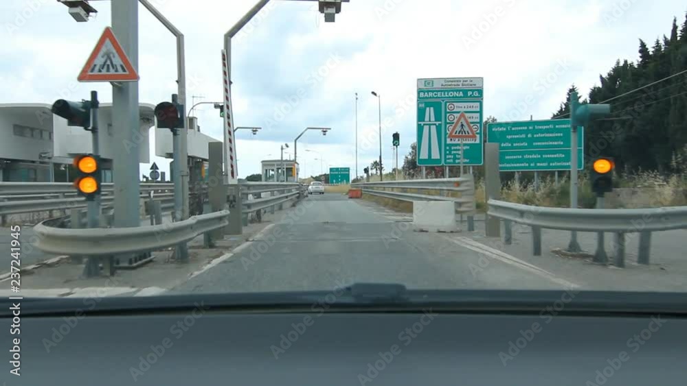 SICILY, ITALY on MAY 25th: Toll booth leaving Barcellona Pozzo di Gotto in Sicily, Italy. Barcellona Pozzo di Gotto is a town and comune of about 50,000 inhabitants in the north coast of Sicily, Italy