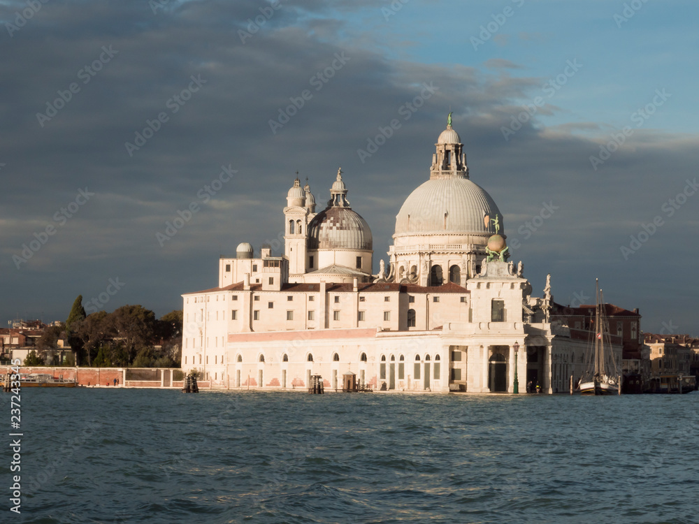 VENICE, ITALY, NOV 1st 2018: Santa Maria della Salute or Saint Mary of Health Church or Basilica facade or exterior view. Venezia landscape. View from grand canal or sea.