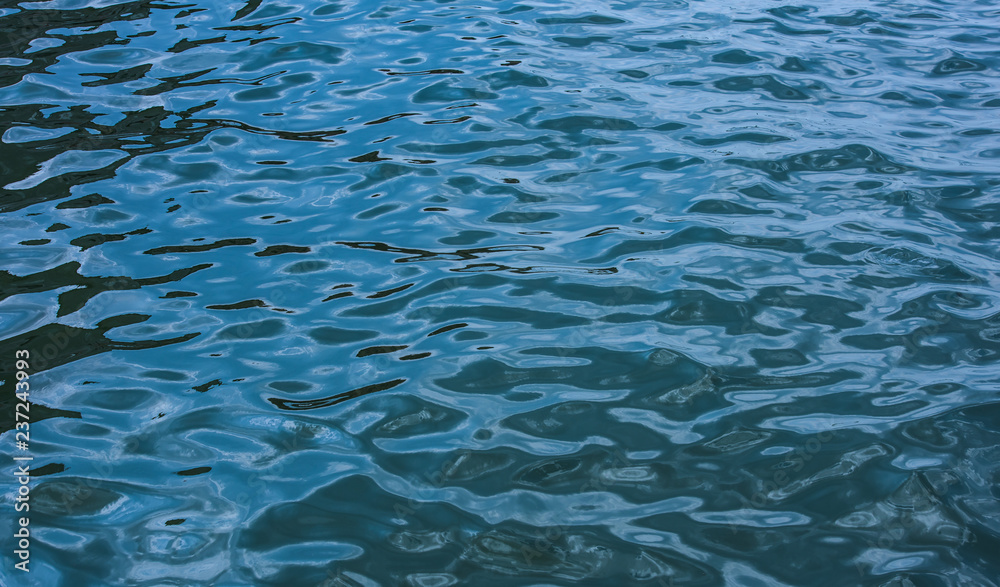 Fototapeta premium Water wave rippels and reflection