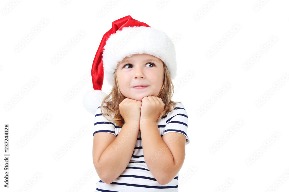 Little girl in santa hat isolated on white background Little girl in santa hat isolated on white background