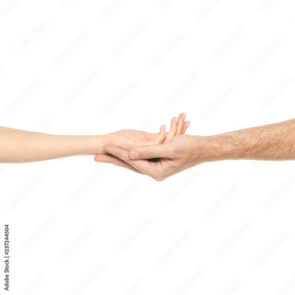 Couple hands held together male female hands on white background isolation