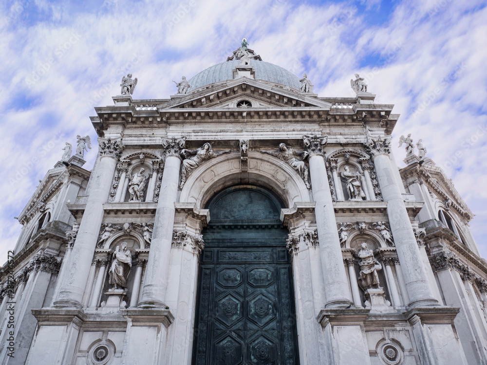 VENICE, ITALY, NOV 1st 2018: Santa Maria della Salute or Saint Mary of Health Church or Basilica facade or exterior view. Perspective ground view.
