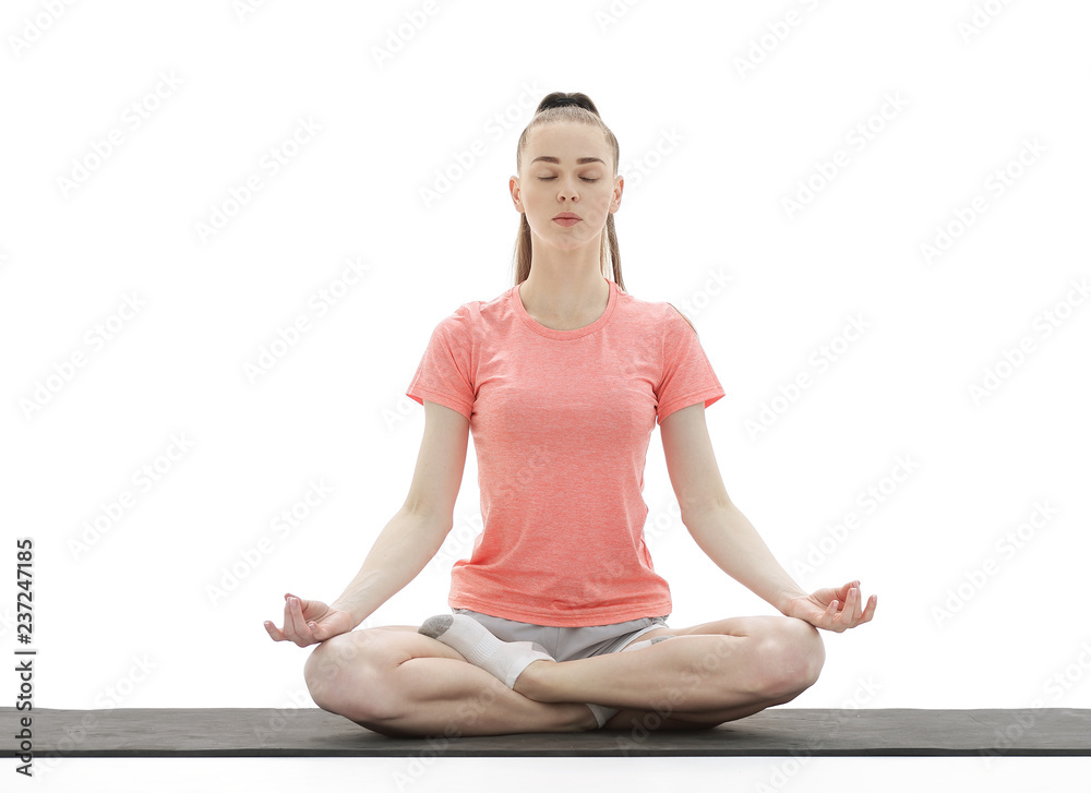 Yoga. Woman Meditating and Doing Yoga Against White background Yoga. Woman Meditating and Doing Yoga Against White background