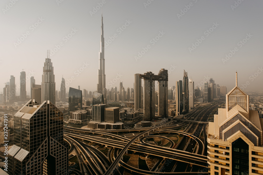 Obraz premium Dubai skyline in the morning, aerial top view to downtown city center landmarks at sunrise. Famous viewpoint, United Arab Emirates