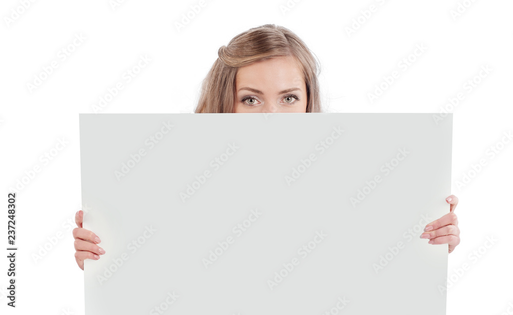 smiling young business woman showing a big blank banner smiling young business woman showing a big blank banner