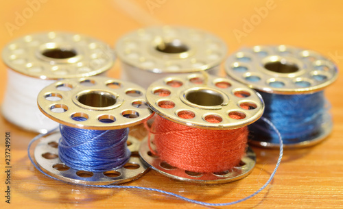 Coil with a sewing thread.