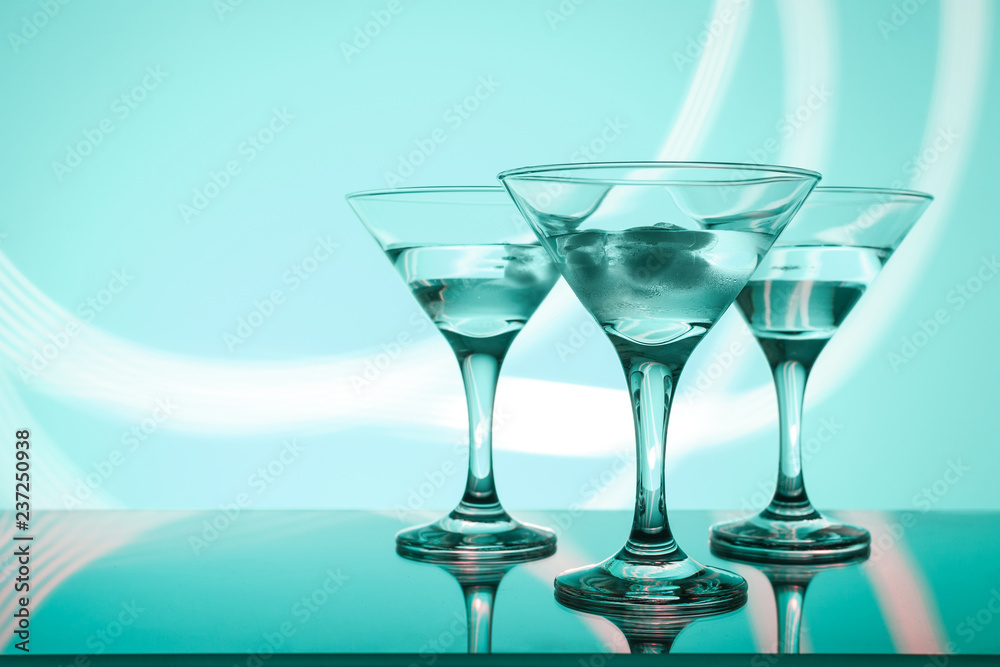 Obraz premium alcoholic glass in the club entourage, copy space, red background