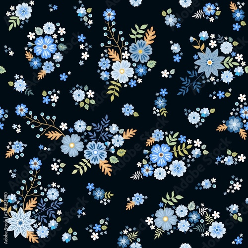 Cute ditsy seamless floral pattern with groups of blue flowers on black background. Fashion design. Print for fabric. Vector illustration.