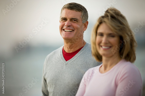 Smiling mature man with his wife. photo