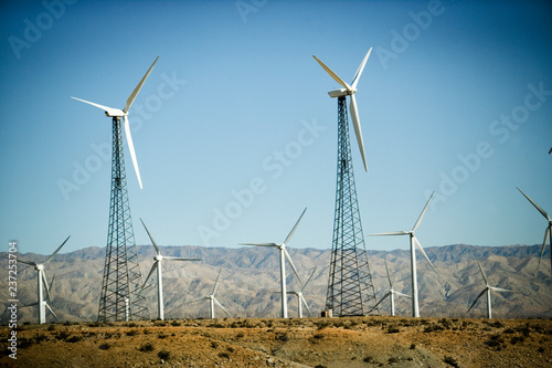 Group of wind turbines in a field. photo