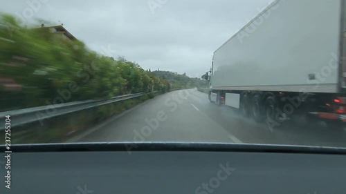 SICILY, ITALY on MAY 25th: Passing truck on Autostrada E90 in Sicily, Italy. European route E 90 is an A-Class West-East European route. photo