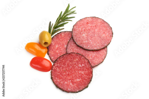 Sliced Salami with herbs, isolated on a white background. Top view